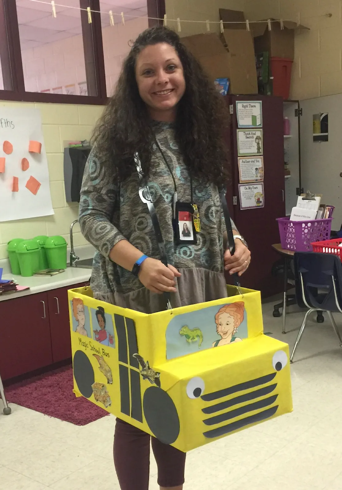 Tegan in a classroom wearing a handmade Magic School Bus costume